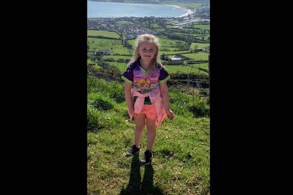 Belfast City Airport has donated potentially life-saving defibrillator equipment to St John’s Camogie Club in Carnlough, in memory of former youth player and Glenarm resident, Maggie Black.  Photo: Sheenagh Black