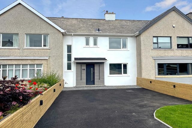 88 Coleraine Road, Portrush, BT56 8HN - a four bed terrace house. Offers over £295,000