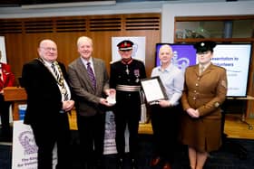 The Lord-Lieutenant of County Antrim and the Mayor of Antrim and Newtownabbey Borough Council present the Chairman of Monkstown Village Initiatives, Stephen Acheson and the Development Manager, Alan Johnston with the King’s Award Crystal and Citation