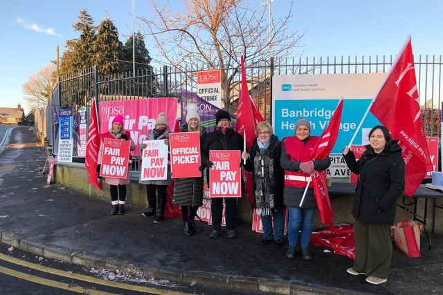 Brrrrr - a very cold day did not deter health workers from attending the picket line outside Banbridge Health Village, Co Down.