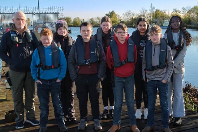 Students from Holy Trinity College are pictured with Gary McErlain, Chair of Lough Neagh Partnership, during a visit to Lough Neagh as part of a pilot schools engagement programme which was successfully delivered by Lough Neagh Partnership and involved The Henry Group of Companies in Magherafelt.Credit: Supplied