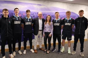 Eimear Gourley, Director at NI Property Girl, with representatives from Lisnagarvey Hockey Club. Pic credit: Lisnagarvey Hockey Club