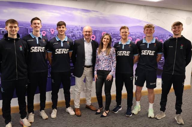 Eimear Gourley, Director at NI Property Girl, with representatives from Lisnagarvey Hockey Club. Pic credit: Lisnagarvey Hockey Club