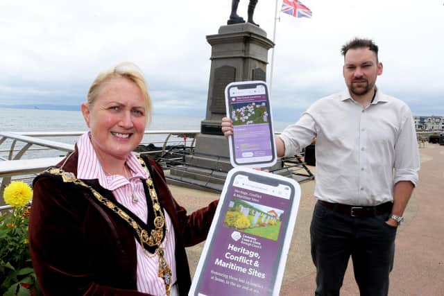 Mayor of Causeway Coast and Glens Borough Council, Councillor Dawn Huggins with Nick Bingham, ICT Digital Analyst from Causeway Coast and Glens Borough Council who devised the website.