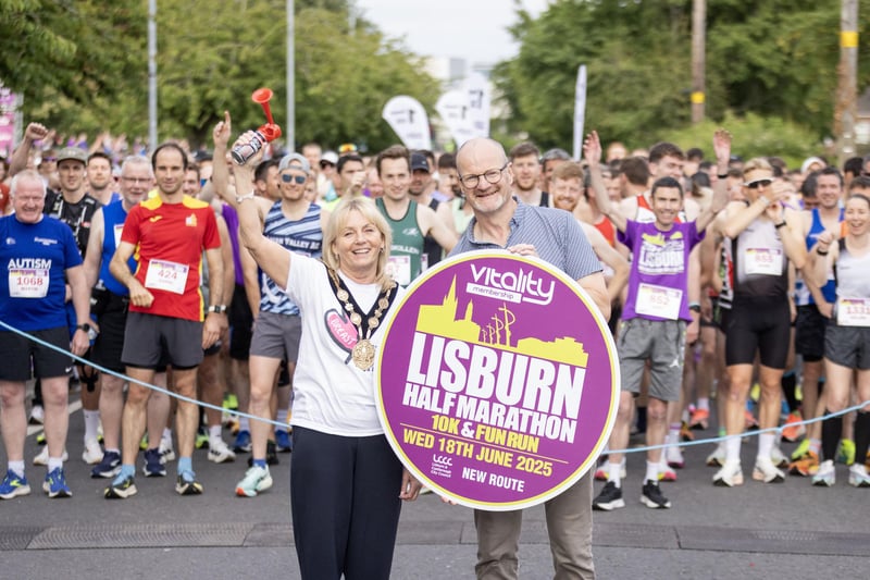 The Mayor of Lisburn & Castlereagh, Alderman Amanda Grehan and the Chair of Communities and Wellbeing, Councillor Tim Mitchell at the start line of the 2025 Vitality Membership Lisburn Half Marathon, 10K Road Race and MB Chicken Fun Run