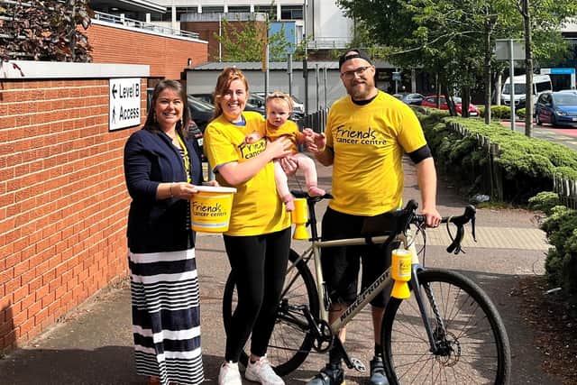 Patrick Grant with wife Lauren and daughter Iris with Friends of the Cancer Centre’s Community Fundraising Officer, Sarah Wilson (left). Pic Credit: Friends of the Cancer Centre