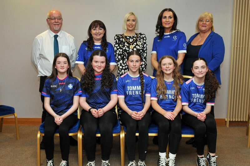 Deputy Lord Mayor, Councillor Sorcha McGeown with the Clan Na Gael, Scor Na Og group. Included are coaches Kerrie Patterson and Briege Lavery.
