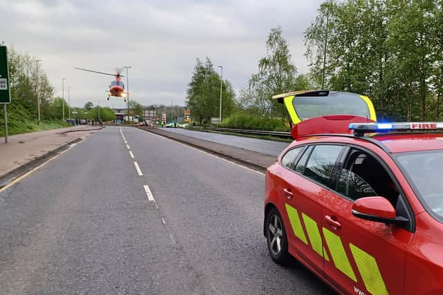 The Air Ambulance attending the scene of the crash on the Larne Road Link in Ballymena. Picture: NIFRS North