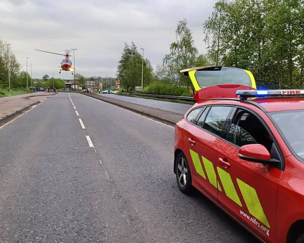 The Air Ambulance attending the scene of the crash on the Larne Road Link in Ballymena. Picture: NIFRS North