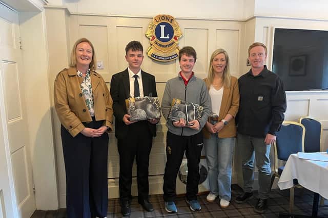 Cllr Joy Ferguson, students John McAuley and Cameron Colgan, Lions Club Youth Exchange convenor Joanne Hobson and President Peter Fairbairn.