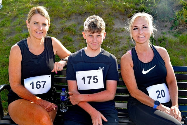 Sitting it out before taking part are from left, Paula McBride, Ryan McBride and Lynsey Daniel. PT24-223.