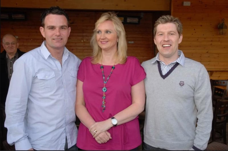 Paul Maxwell and Thomas Hamilton who provided the music during the 2009 Parents Against Cancer auction night in the Olderfleet Bar pictured with one of the organisers, Jacqueline Clarke.