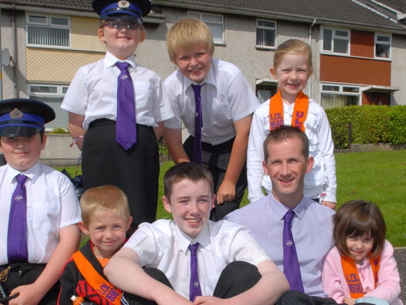 Members of Larne Harbour Accordion Band and Lodge relax in the sunshine at Carrick. INLT 29-313-PR