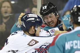 Ray Sawada of the Belfast Giants fights Brad Plumpton of the Dundee Stars during 7-1 win in the Elite League game at the Odyssey Arena, Belfast in 2014. Picture: Michael Cooper
