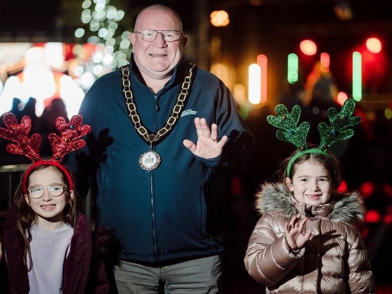 The Mayor with two little reindeers - Ella and Hannah McCloy.