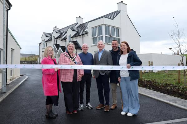 (L-R): Heloise Brown, Department For Communities, Sandra Hunter, Deputy Mayor of Causeway Coast and Glens Council, new tenant Ruari Morgan, Chief Executive of Rural Housing Association, Stephen Fisher, Chair of Rural Housing Association, Tom Potter, and Pamela Johnston, Northern Ireland Housing Executive Rural Unit