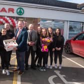 The Wright family and store staff celebrating 15 years of Wright’s SPAR.  Picture: Tony Hendron.