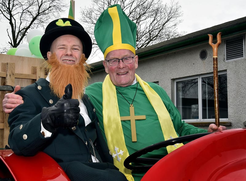 St Patrick, AKA Pat Christie and the Juggling Lephrahaun, Paul McAtarsney arrived at the Darrymacash St Pat's Fun Day on a tractor. LM12-230.