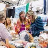 Group of visitors shopping for Crochet
