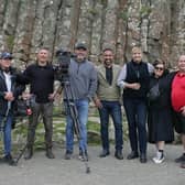 L-R Kathryn Ryan, sound; Daniel Gustafson, producer; Dean Haydon, cameraman; Adam Dovile and Johanna Greggs, TV presenters; Lisa Mejuto, hair and make-up and Anthony McAuley, National Trust storyteller, during filming for Better Homes and Gardens at the Giant’s Causeway.