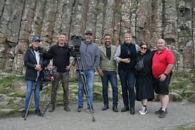 L-R Kathryn Ryan, sound; Daniel Gustafson, producer; Dean Haydon, cameraman; Adam Dovile and Johanna Greggs, TV presenters; Lisa Mejuto, hair and make-up and Anthony McAuley, National Trust storyteller, during filming for Better Homes and Gardens at the Giant’s Causeway.