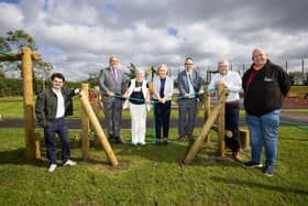 Pictured at the new Drumbo Trim Trail are (l-r): Councillor Kurtis Dickson; Councillor Uel Mackin; Hazel Thompson, Drumbo & District Community Development Group; Louise Moore, Director of Communities and Wellbeing at Lisburn & Castlereagh City Council; Chris Taylor, Head of UKSPF Northern Ireland; Councillor Andrew Gowan and Ian Patterson, Poundbridge & District Community Association