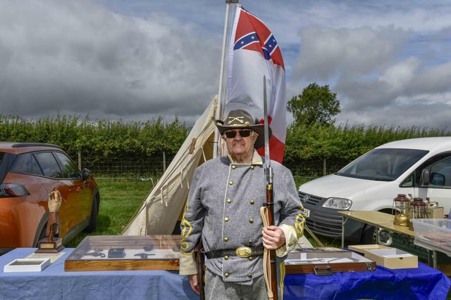 A Confederate Lt General (John Tate) is on parade with his Colt pistol, and unusually for an officer, a musket with bayonet fixed.