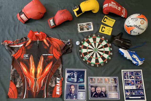 Sporting memorabilia goes under the hammer in aid of the Mayor's charities