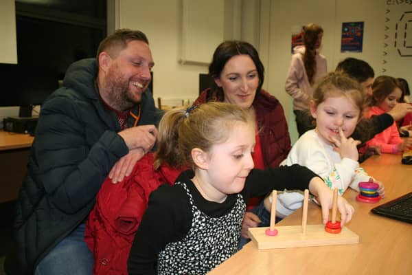 Lisburn parents, Kieran and Jasmin Bourquin with daughters (l-r) Eliza and Genevieve, who took part in the Come and Try IT computing workshops hosted at SERC’s Lisburn Campus which introduced primary school-aged children to the world of computing.