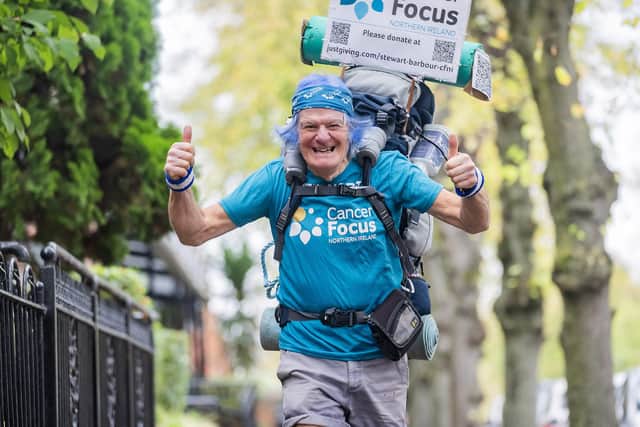 Lisburn man Stewart Barbour is walking 560 miles through Northern Ireland's 50 largest towns to raise money for Cancer Focus NI. Pic credit: Cancer Focus NI