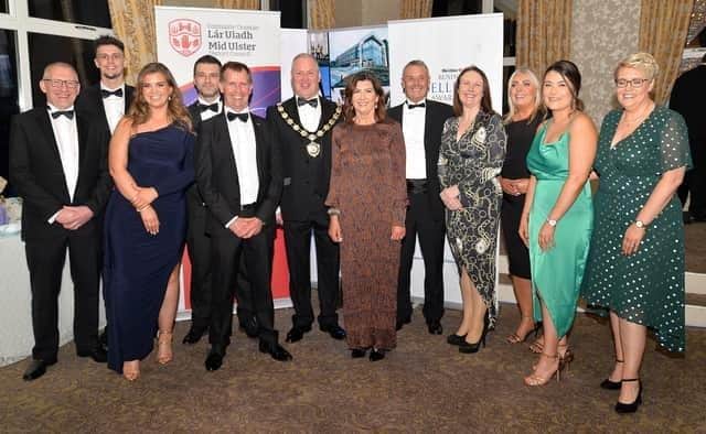 Chair of Mid-Ulster Council, Paul McLean, centre, pictured with guests from the main sponsors, Henry Bros, at the Mid-Ulster Business awards in 2021.