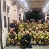 Firefighters from Larne Station were recently presented with the King's Coronation Medal. (Pic: NIFRS).