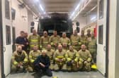 Firefighters from Larne Station were recently presented with the King's Coronation Medal. (Pic: NIFRS).