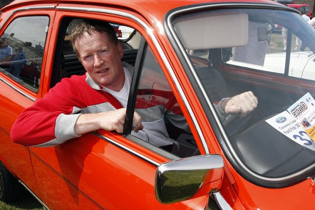 IN THE DRIVING SEAT...Roy McKane relaxing in his car during the Ford Fair in Portrush back in 2010