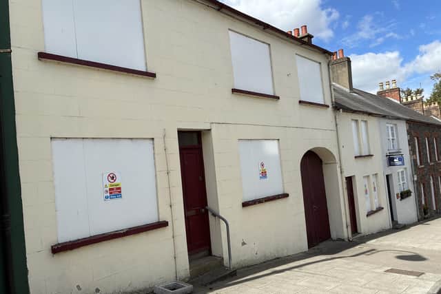 Plans for the development of 17-19 Main Street, Hillsborough have been rejected due to concerns for the wall at Hillsborough Castle. Pic credit: LDRS