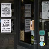 Signs in a coffee shop in Main Street Fort William as people are asked to stop travelling to the Scottish Highlands in a bid to avoid spreading the coronavirus (Photo: Jeff J Mitchell/Getty Images)