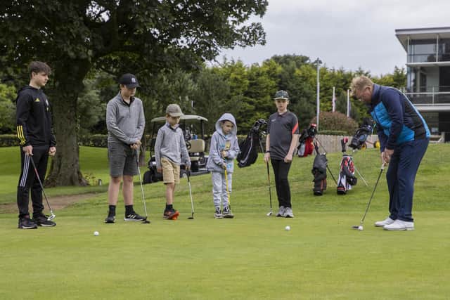 PGA Professional at Castlereagh Hills Golf Course, Wesley Ramsay and participants in the 2023 Junior Golf Coaching Programme. Pic credit: Lisburn and Castlereagh City Council