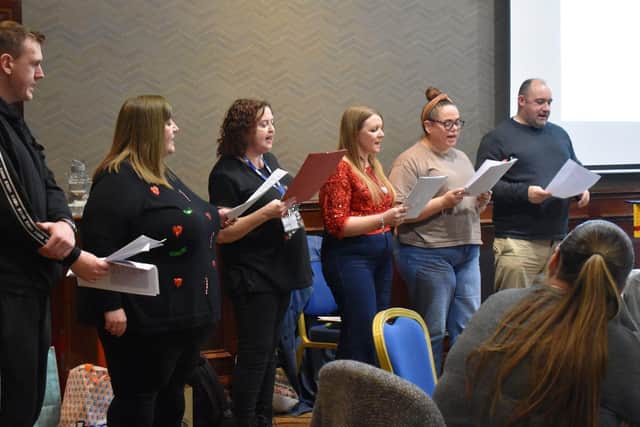 ASCERT's Recovery Choir will take part in BBC's Big Sing in the Ulster Hall later this month. Pictured L-R: Neil, Fiona McCann, Siobhan Wolfe, Ashleigh Connor, Lorna Fennell, and Keith Pyper. Pic Credit: Emma Otten