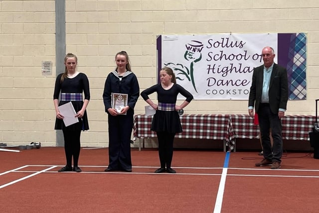 Highland dancers with their certificates presented by Councillor Trevor Wilson, Ulster Scots representative. Credit: Jillian Lennox