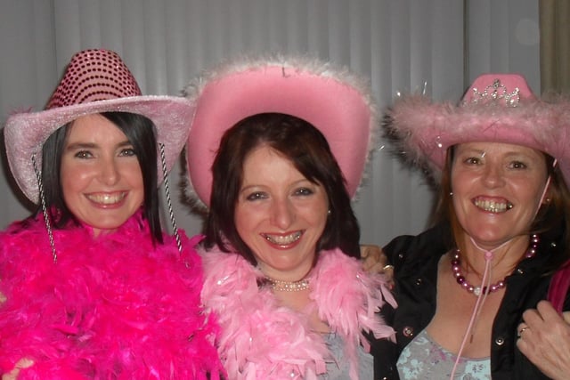 Paula Cauley, Sylvia Tumelty and Jacqui Teacy are all smiles during the Pink Night for the Ulster Cancer Foundation in the Railway Arms Bar, Coleraine, in 2009