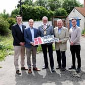 Pictured, from left: Alpha Housing Chief Executive Cameron Watt, Communities Minister Gordon Lyons MLA, the Mayor of Mid and East Antrim Borough Council, Alderman William McCaughey, East Antrim MP Sammy Wilson, and Mike Martin from the Martin Property Group. Picture: Darren Kidd / Press Eye