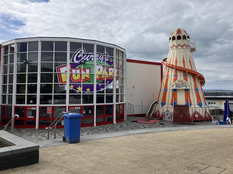In 1926 Barry's Amusement Park was opened by James Chipperfield (aka Ernest Barry) of the famous English fairground and circus family. His daughter Evelyn married Frank Trufelli, a renowned animal trainer who toured with the Royal Italian Circus. The iconic Portrush business remained in the Trufelli family until 2022 when it was taken over by the Curry family, who also operate Curry's Fun Park in Salthill, County Galway. Whatever you choose to call it, Portrush = Curry's/Barry's: the sounds of it, the smell of it, the heat of it, the green jackets of the 'Barry's boys', the ghost train, the Big Dipper - all are etched into the memory of every child who grew up in this town.