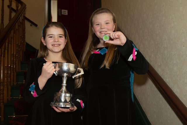 Prizewinners...Alice Miller, left, who was awarded the trophy for Most Promising Dancer under 9 years and Lara Wright who came first in the Light Double Jig under 9 years at the Portadown Folk Dancing Festival Confined Section. The girls are members of the Portadown Folk Dance Academy. PT10-233.