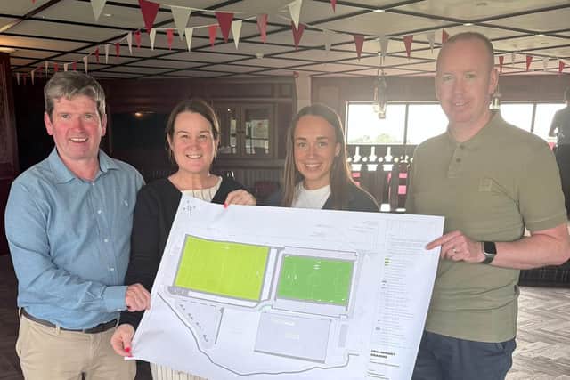 GAA and soccer pitch designs with supporters of the Ballypitmave Community Development and Cllr Gary McCleave. Pic credit: LDRS