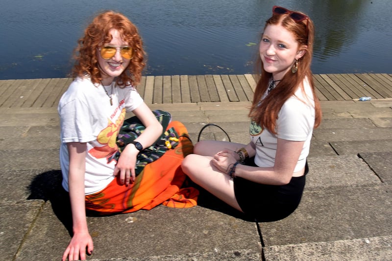 Taking a break from studying for their A' Levels and enjoying the hot spell are Portadown College students Hannah Weir, left, and Emma Gough. PT22-244.