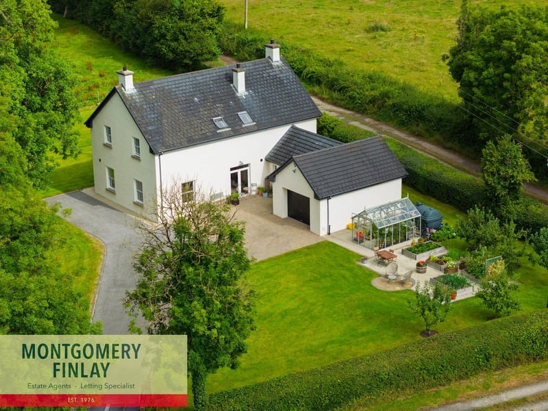 This exceptional four-bedroom detached countryside residence was constructed in 2017. Occupying an elevated site surrounded by beautiful countryside, Navar Cottage has a magnificent double-height entrance hall to the spectacular open-plan kitchen. There are two spacious reception rooms, including a cosy living room with multi-fuel stove, and a separate snug with French doors. Outside, beautifully landscaped gardens include raised vegetable beds, a premium Rhino greenhouse, a mature orchard and a charming patio positioned to enjoy the countryside views. It's on the market for a guide price of £485,000 with Montgomery Finlay.
