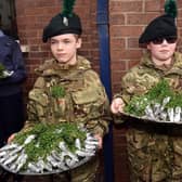 Two young members of the Army Cadet Corps, David Leeman, left, and Jake Kelly with the shamrock sprigs which were presented to members of Portadown RBL and Cadets on Saturday. PT12-215.