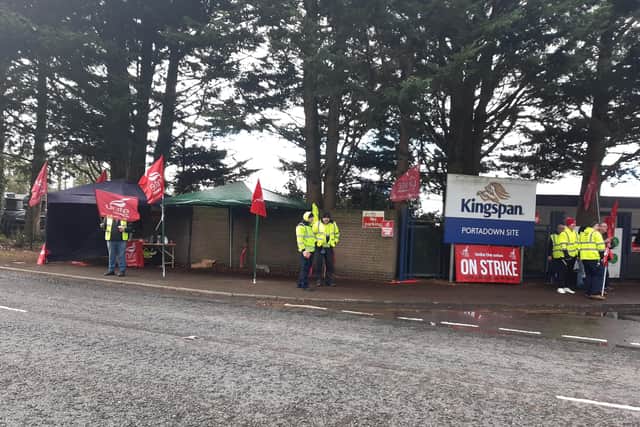 Workers at Kingspan in Portadown are taking part in strike action over pay.