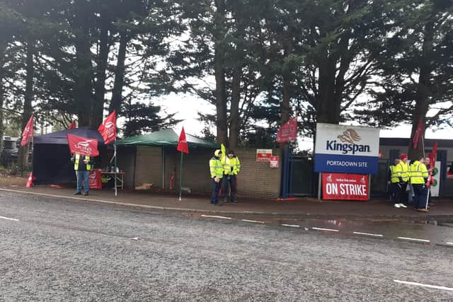 Workers at Kingspan in Portadown are taking part in strike action over pay.