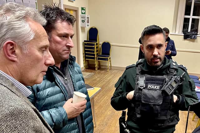 Ian Paisley MP, Uel Kane, and Frank McCaughan with Neighbourhood Policing Inspector Stevie Burns